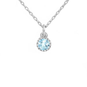 Delicate sky blue topaz solitaire pendant on a simple silver chain. 