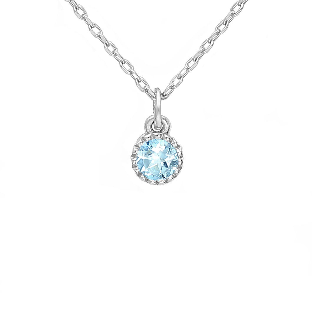 Delicate sky blue topaz solitaire pendant on a simple silver chain. 