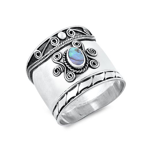 Chunky silver bohemian Bali ring with an oxidised finish. Embellished with an abalone stone and detailed with silver rope and swirl designs.