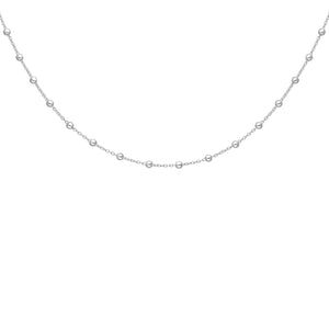 Pretty, delicate silver chain necklace with small silver balls distributed evenly throughout the chain.