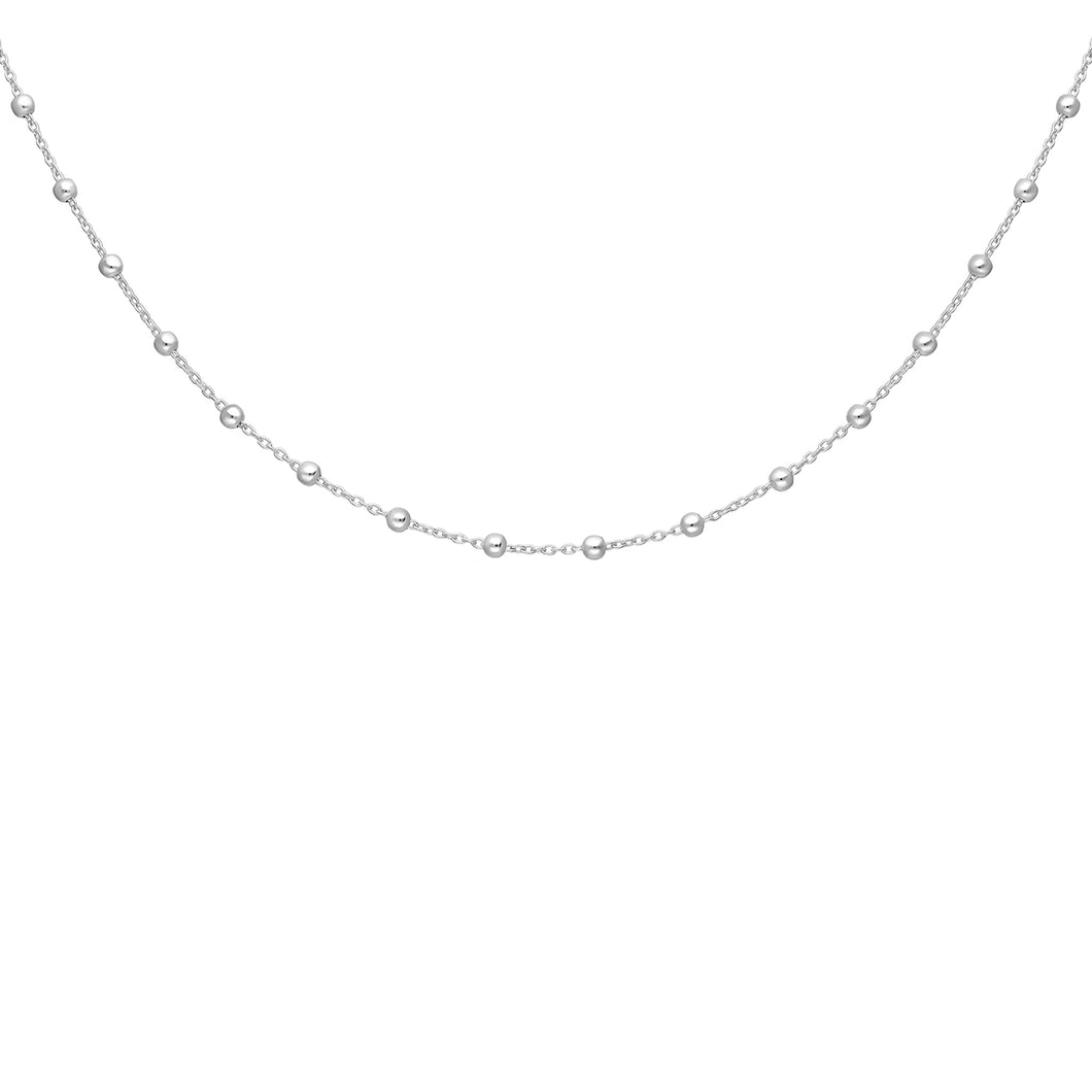 Pretty, delicate silver chain necklace with small silver balls distributed evenly throughout the chain.