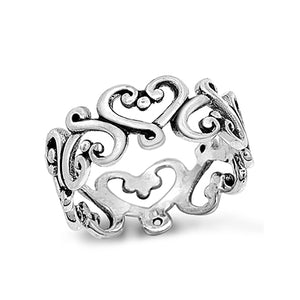  Chunky silver bohemian Bali ring. The band of the ring is comprised of interconnecting cut out heart shaped swirls with a small silver dot detail in the centre of each heart. 