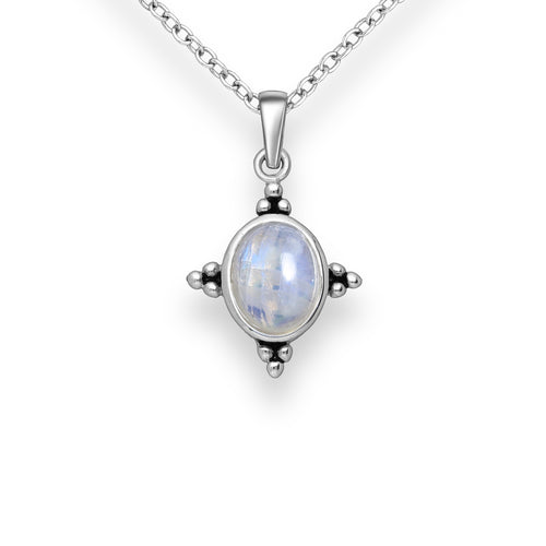 Delicate and pretty oval cut rainbow moonstone pendant necklace. The stone is decorated with four triangles comprised of three small silver dots, each of which are positioned at the top, bottom and each side of the pendant. 