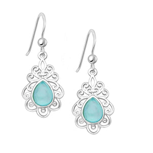 Pretty and delicate silver bohemian drop earrings embellished with pear cut aqua chalcedony stones. An intricate cut out swirl design surrounds each stone. 