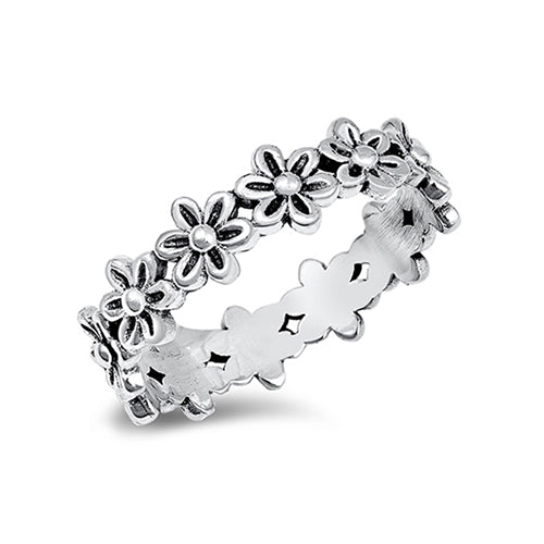 Pretty silver flower ring with an oxidised finish. The band of the ring is comprised of interconnecting identical flowers. 