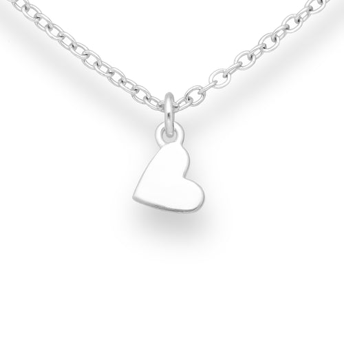 Pretty and delicate silver heart pendant necklace. The pendant is designed to hang sideways from the centre of the chain. 