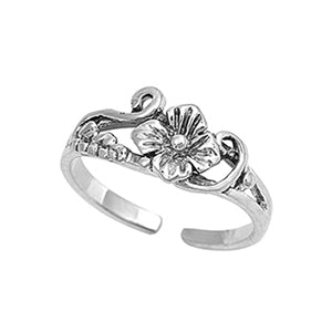 Bohemian silver flower midi ring with an oxidised finish. A flower sits in the centre of the ring and is surrounded by swirls and leaf details which are interwoven into the band of the ring.